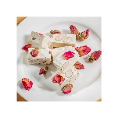 China Factory direct sale low sugar Rose Almond Nougat Candy Manufacturer semi-sweet in Taiwan China for sale