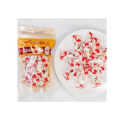 China Factory direct selling low sugar cranberry flavor nougat almond cranberry candy for sale