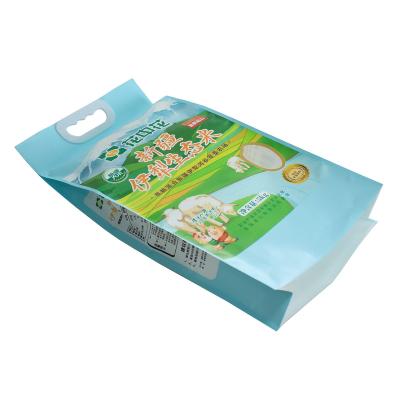 China Plastic 1kg 2kg 5kg 10kg Thailand Flat Bottom Basmati Rice Packaging Moisture Proof Custom Printing Bag With Handle for sale