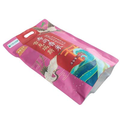 China Moisture Proof Custom Digital Printing Plastic Heat Seal In Different Size Of Vacuum Rice Bag With Handle for sale