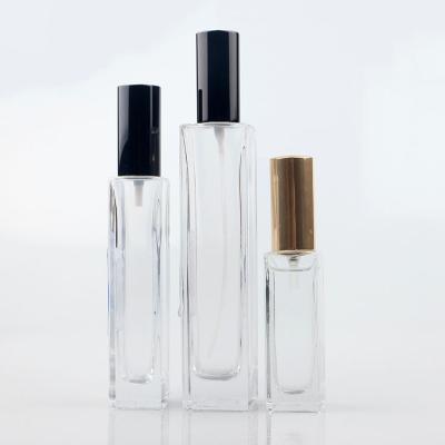 China Personal Care Clear Square 20ml 50ml 100ml Empty Glass Bottle For Perfume With Pump Spray for sale