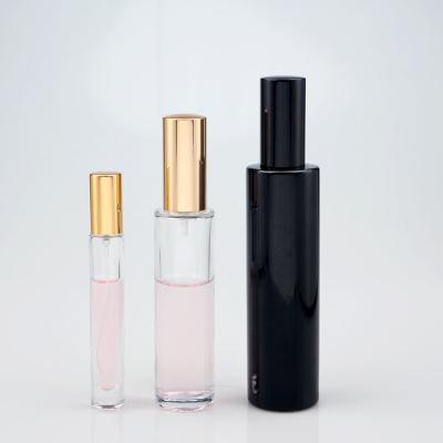 China 30ml 50ml 100ml Cosmetic Cylinder Shaped Sprayer Glass Perfume Bottles With Pump for sale