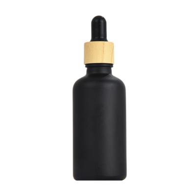 China 10ml 15ml 20ml 30ml 50ml 100ml Essential Oil Cosmetic Matte Black Round Glass Bottle With Dropper for sale