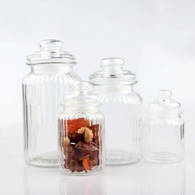 China Custom 230ml 350ml 950ml 1350ml Country Style Kitchen Glass Container Food Storage Jars With Lids for sale