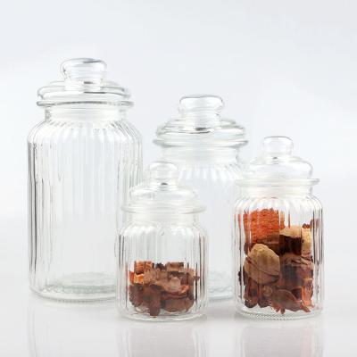 China Food grade 230ml 350ml 950ml 1350ml clear stripe glass food storage jar for cereral with glass lid for sale