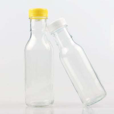 China Beverage factory wholesale milk bottle with screw lid 250ml 350ml glass bottle for sale