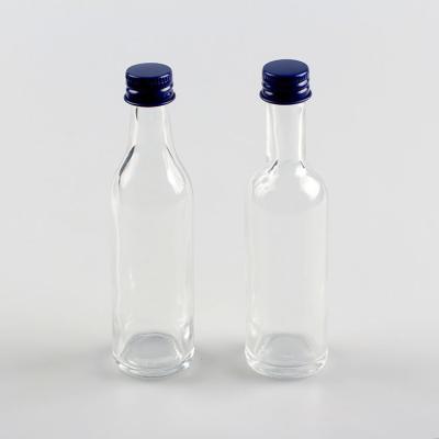 China New Products 50ml Round Liquor Bottle Plum Glass Beverage Small Wine Bottle With Screw Cap for sale