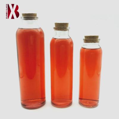 China Beverage 250ml 300ml and 500ml fashion glass tea bottle with cork for sale