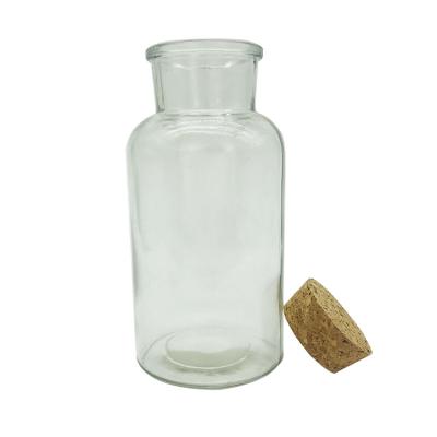 China 550ml pharmaceutical clear reagent glass bottles with cork for lab for sale