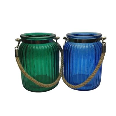 China Eco - Friendly Antique Cylinder Style Round Bottom Hanging Vase Blue / Green Glass Bottle With Rope Decoration for sale