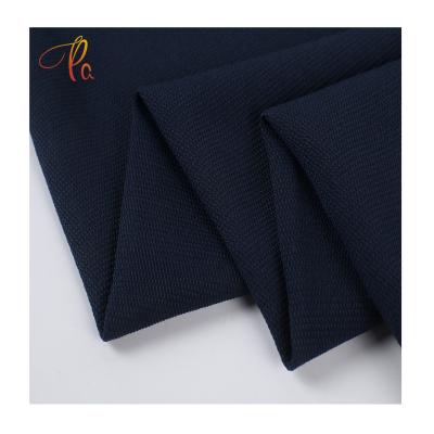 China Original Factory New Type SPH Fiber Grain Texture Navy Blue Tear-resistant Plain Dyed 100% Polyester Fabric For Clothing for sale