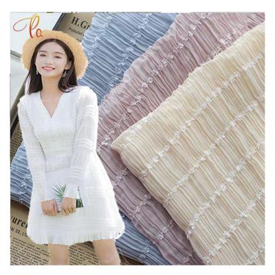 China New Breathable Fashion Embroidery Chiffon Jacquard Crepe Fabric Soft Polyest Stripe Fabric Pleated Fabric For Women Dress for sale