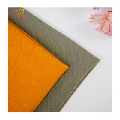 China Shaoxinng Factory High Quality Tear-Resistant Stretch Fabric For Women Clothes CEY 100% Polyester Four Way Fabric for sale