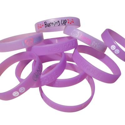 China Fashionable Cheap Custom Sensitive Silicone Band UV Ball Shape Gift Wristband for sale