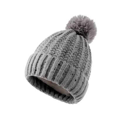 China JOINT JOINT Ladies Solid Color Furry Lining Knit Beanie Hat Fashion Pom Pom Winter Skull Hats For Gift for sale