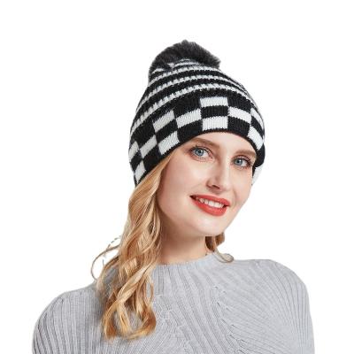 China Hot Sale COMMON Ski Hats Women Winter Beanies COMMON Knitted Warm Stripped With Pom Pom for sale