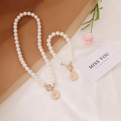 China Vintage Coin Necklace Temperament Fashion Clavicle Chain Jewelry Sets Combine Imitation Pearl Bracelet Sets For Women Party Wedding for sale