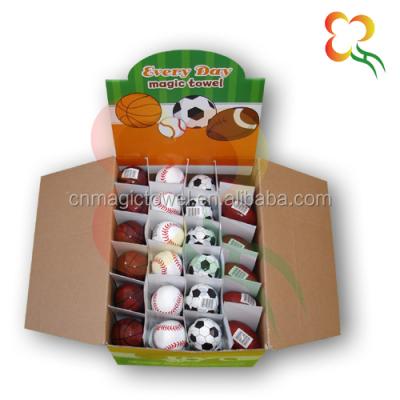 China Compressed Football Towel Compressed Gift With Display for sale