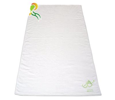 China Compressed 100% Cotton Embroidery Beach Towel Compressed Portable Package Promotional Beach Towel for sale