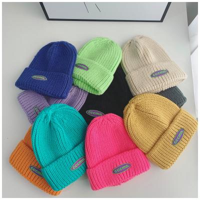 China Wholesale Casual Warm COMMON HIP HOP Solid Color Logo Women Winter HIP HOP Custom Embroidery Knitted Beanies Hat for sale