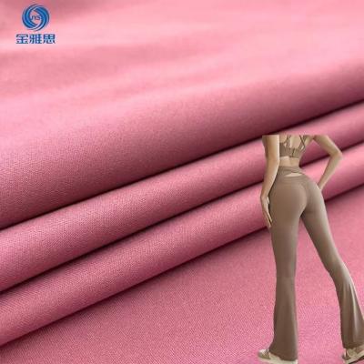 China Stain Repellent New high elastic knitted fabric matte double elastic casual knitted fabric suitable for women's casual pants for sale