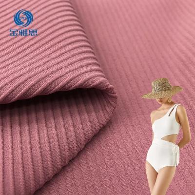 China Stain Repellent New swimsuit ribbed fabric 4-way stretch stretch knitted fabric UPF50 77 nylon 23 spandex swimsuit fabric for sale