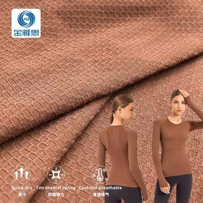 China Stretch New warp knitted jacquard stretch fabric 85%Nylon 15%spandex suitable for athletic wear yoga wear for sale