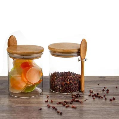 China Food Sugar Bowl Clear Glass Canister Jar with Bamboo Lid and Spoon for Kitchen Storage for sale