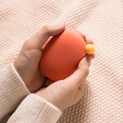 China Eco-Friendly Reusable Pocket Winter Silicone Warm Wrap Heat Pack Hand Warmer Hand Warmer Contains Natural Heating Warm Wrap for sale