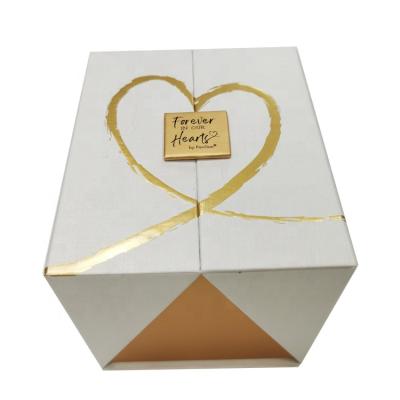 China Recyclable Professional Handmade Customized Logo Holiday Paper Hardboard Rigid Gift Box With Shredded Paper Backing for sale