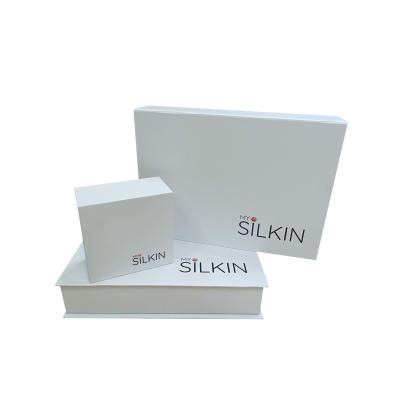 China Recyclable Custom Logo White Wig Hair Extension Magnetic Packaging Box With Red Velvet Paper Tray for sale