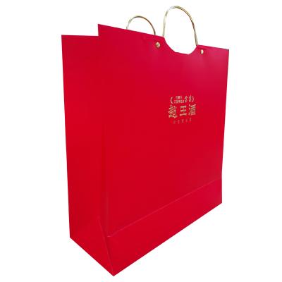 China New Design Handmade Red Creative Paper Shopping Gift Bag With Gold Metal Handle for sale