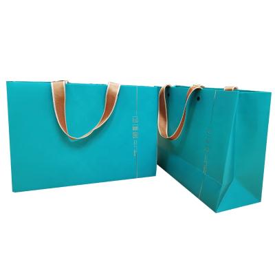 China New Design Handmade Cosmetic Metal Button Gift Paper Shopping Bag Creative Box With Ribbon Handle for sale