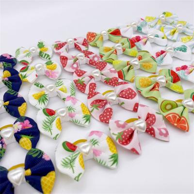 China Viable Wholesale Fancy Cat Dog Hair Accessories Dog Grooming Bows Floral Dog Hair Bows for sale