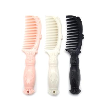 China Home Wholesale Latest Universal Design Small Plastic Hair Comb for sale