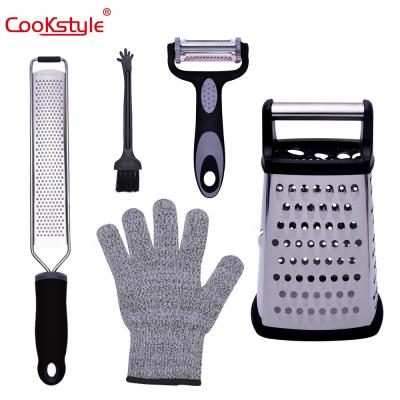 China Viable Hot Selling Stainless Steel Grater, Peeler, Zester, Mitt and Cleaning Brush for Kitchen Tools for sale