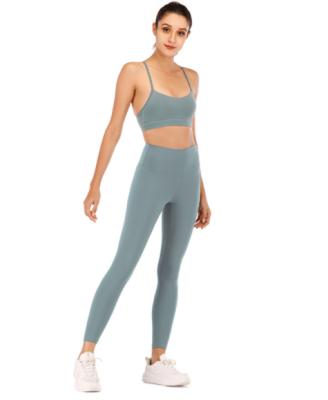 China Breathable Ladies Fitness And Yoga Wear Sets Workout Leggings Fitness Clothing Wear Seamless Womens Yoga Set for sale