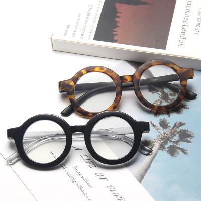 China Eyewear trade retro small round frame glass children anti-blue glasses round frame mirror flat color jelly color personalized baby glasses 2021 for sale