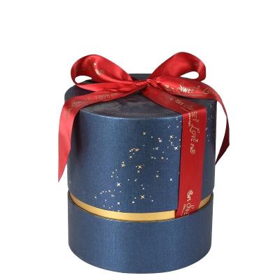 China Biodegradable Hot Selling Metallic Blue Color Gift Box Round Ribbon Around Gift Packing Box for sale