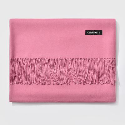 China Anti-wrinkle selling designer autumn/winter monochrome cashmere for women luxury long fringed scarf for sale