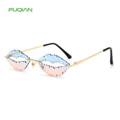 China Fashion Sunglasses Shape Metal Lip Shaped Frame Rimless Designer Women Sunglasses for sale