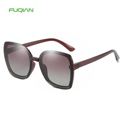 China Fashion Sunglasses New Trend Female Diamonds Lenses Polarized Women Shape Rimless Sunglasses for sale