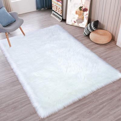 China Cheap Price Washable Hot Selling Faux Sheepskin Rug Bedroom Floor Blankets Faux Fur Blankets Rugs for sale