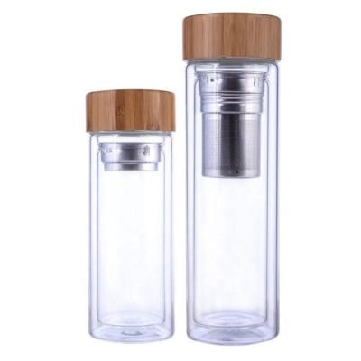 China Hot Selling Sustainable 450ml Double Tea Infuser Transparent Glass Water Bottles With Wooden Lid for sale