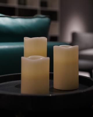 China Home decoration high quality remote control timing flameless ivory led flickering simulation taper wax candle for sale