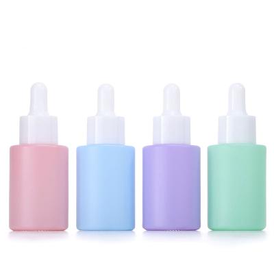 China Personal Care Stock 30ml Flat Shoulder Frosted Pink Purple Skin Care Serum Dropper Bottles for sale