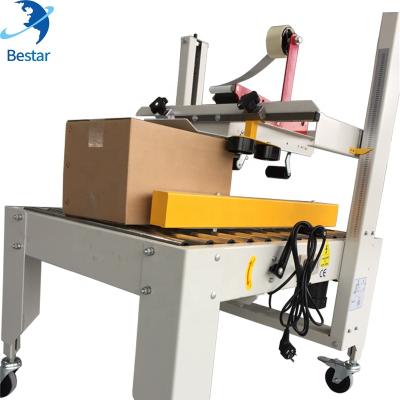 China Automatic Food Carton Sealer Machine In Seal Packing Carton Box Machinery for sale