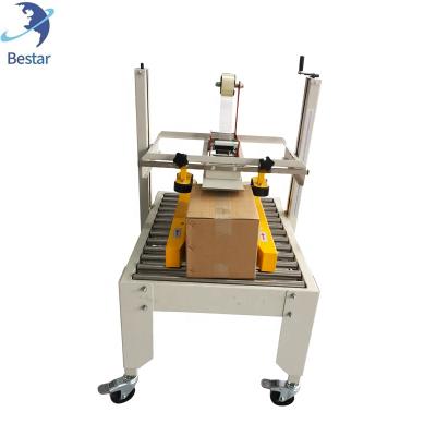 China Automatic Food Goods Adhesive Tape Carton Sealer Machine Carton Box Case Packing Machine for sale