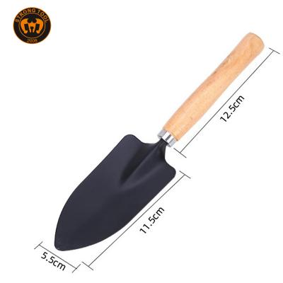 China Multi Function Garden Tool Mini Garden Tool Spatula Rake Seedling Digging Machine For Outdoor Potted Flowers Iron Wood Black for sale