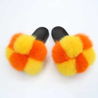 China Colorful Real Fur Slides Women Fashion Trend Fashion Ball Slippers Big Fur Ball for sale